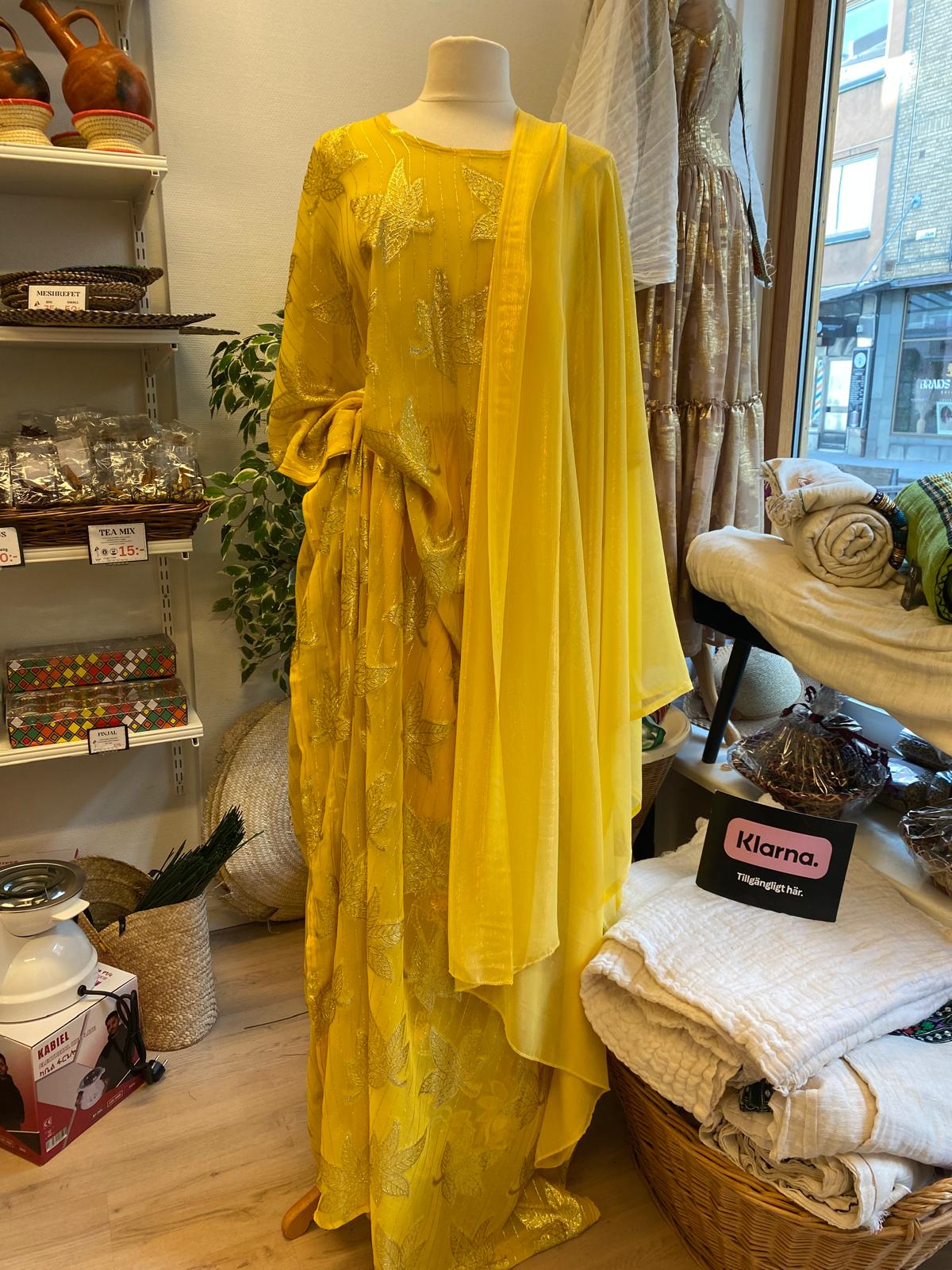 baati dress Yellow Print Cotton Maxi This is Bacyare Bati dress is for everyday wear Loose-fitting Gown Baati Somali Dress