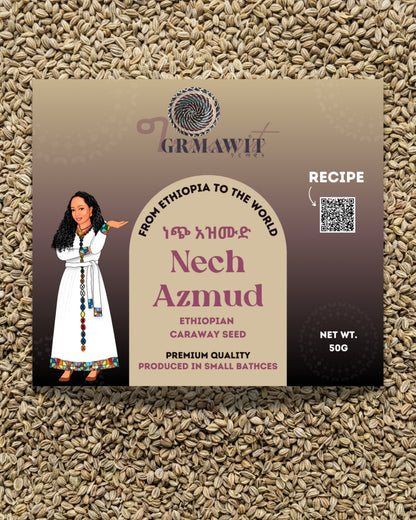 A 500g package of Grmawt Nech Azmud Ethiopian Caraway Seed, featuring a beige and brown label with a traditional Ethiopian woman illustration, set against a background of loose caraway seeds.